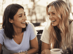 Home 13 friends at cafe laughing